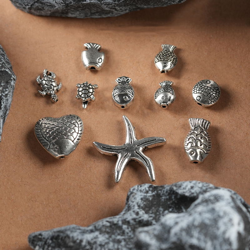 Imitation Xizang silver jewelry small turtle perforated beads accessories DIY vintage woven pendant chain small fish turtle jewelry accessories