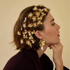 レトロな宮廷風真珠の花のヘアピンのフランス風の気質のサイドクリップは軽くて豪華で高級感があります。