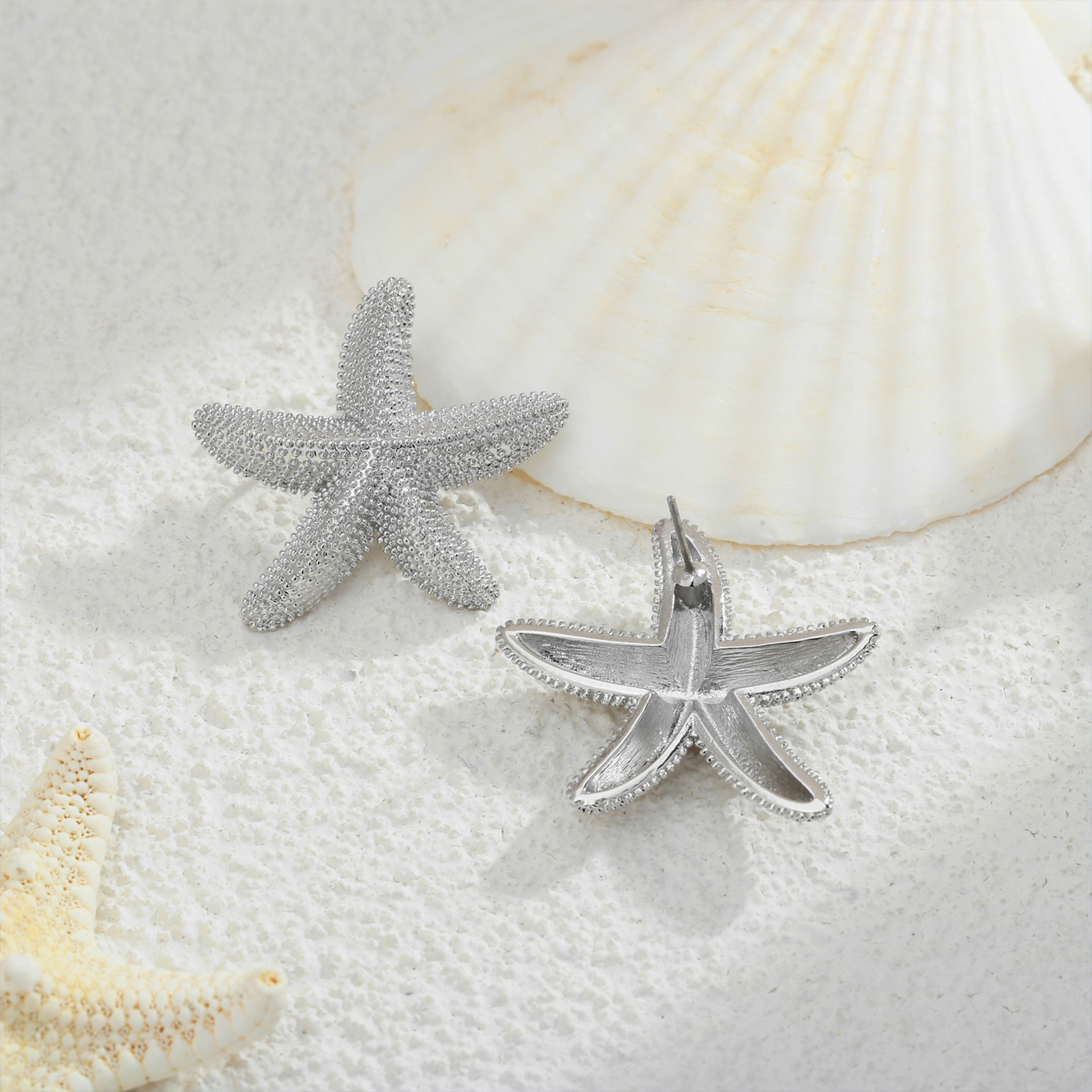 european-and-american-ocean-series-golden-starfish-earrings-irregular-geometry-five-pointed-star-earrings-light-luxury-high-end-womens-earrings