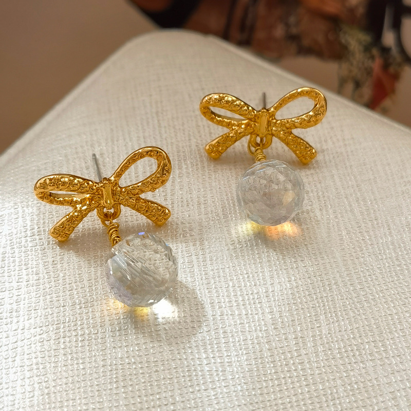 Copper earrings with bow drop-shaped