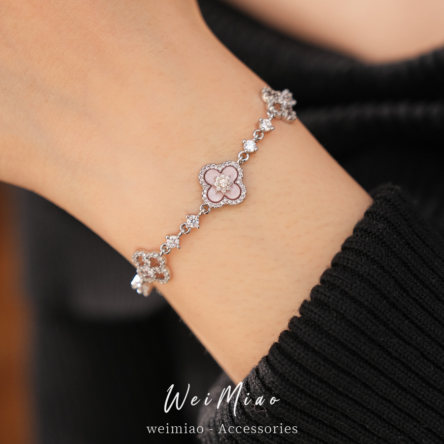 Exquisita variedad de diamantes de diamante flor hueco pulsera ligera de lujo pulsera alta sensación de moda moda joyas al por mayor