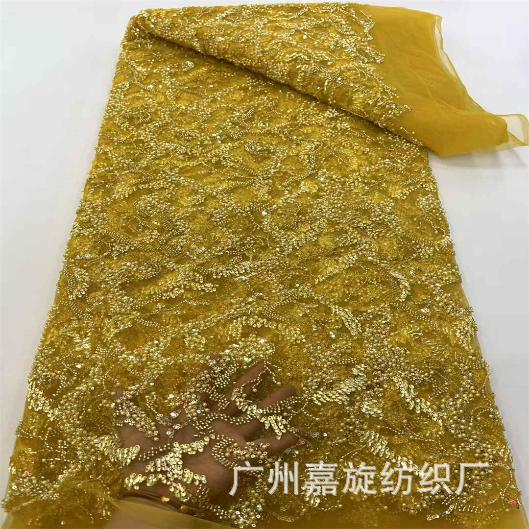 Tela de encaje francés con lentejuelas y cuentas bordadas en tubo con un exquisito patrón irregular al estilo francés para vestido de novia.