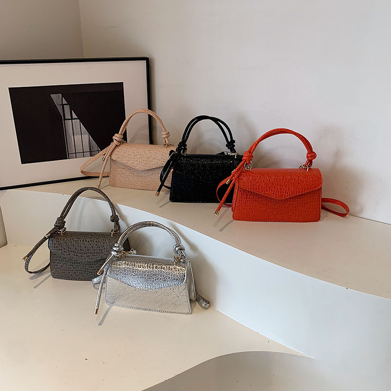 Cara brillante simple y elegante bolso coreano de nudo 2024, nuevo estilo extranjero, bolso de alto valor, bolso pequeño.