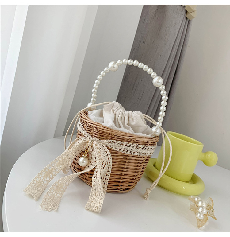 Fashion Round Straw Pearl Portable Bag display picture 26