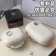 7日間の携帯用薬箱の分注箱の屋外の1週間の旅行の錠剤のアクセサリーのミニ貝殻の収納の密封箱