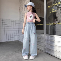 夏の女の子の刺繍デニムのズボン2025年の新型の洋気の女の子のゆったりとした通気性の天糸の蚊よけのジーパン