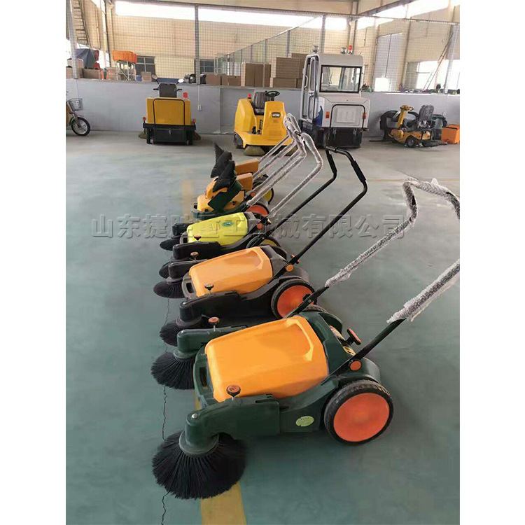 Barredora de suelo empujada a mano para taller Equipo de limpieza de residuos corrosivos industriales Barredora de calles plegable