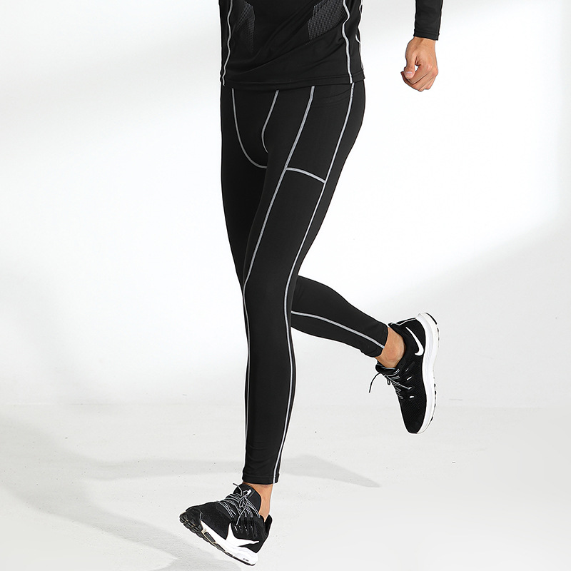 Europa y América nuevas medias deportivas de los hombres de secado rápido transpirable entrenamiento fitness pantalones corriendo baloncesto alto elástico polainas