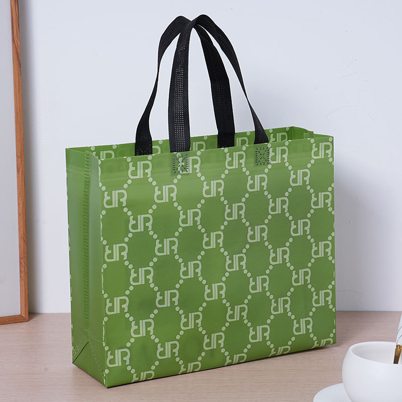 Bolsas de tela no tejida retro clásicas bolsas de compras portátiles publicitarias de ropa impresa en color bolsas de embalaje de película impresa personalizada stock