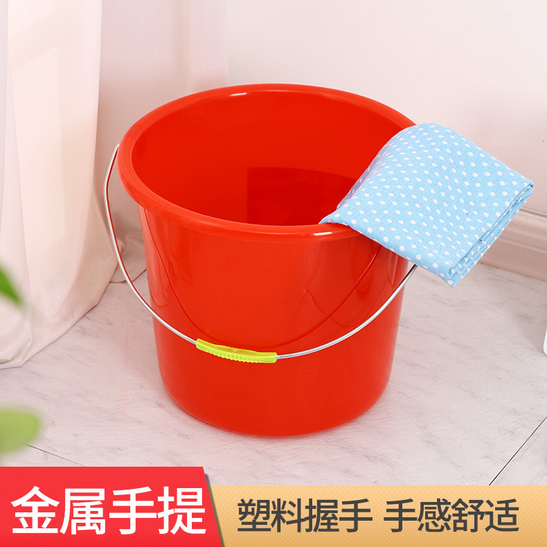 Red plastic handheld bucket for home use