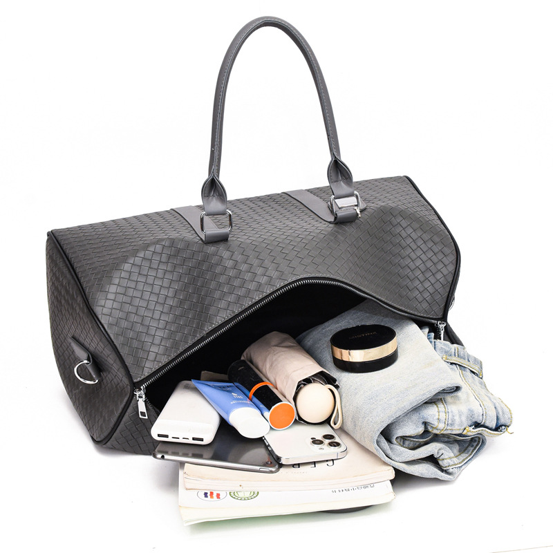 2024 Bolso de viaje portátil tejido nuevo transfronterizo de ocio de gran capacidad anti-salpicaduras de agua Bolso de equipaje de viaje de negocios de corta distancia