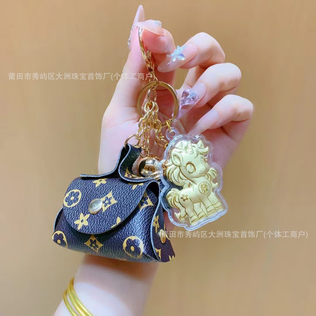 Año del Caballo de oro llavero de automóvil pequeño colgante 999 dinero de inmediato bolso llavero personalizado pequeño regalo