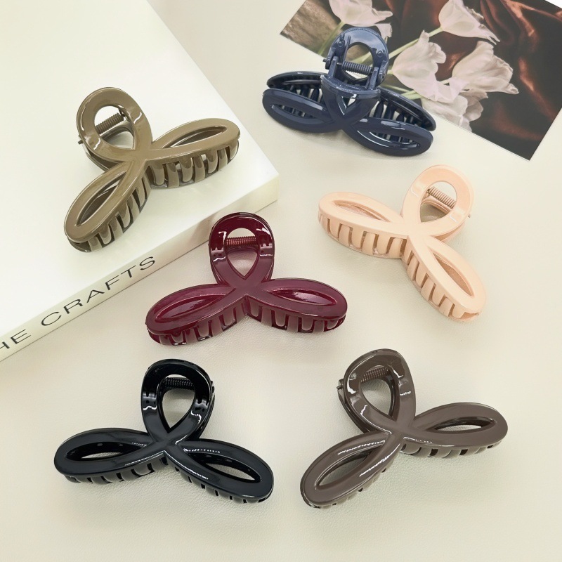 Pearl twist hair clip with plastic embellishment women's Korean side clip Korean style individually packaged pastoral two-yuan store accessories