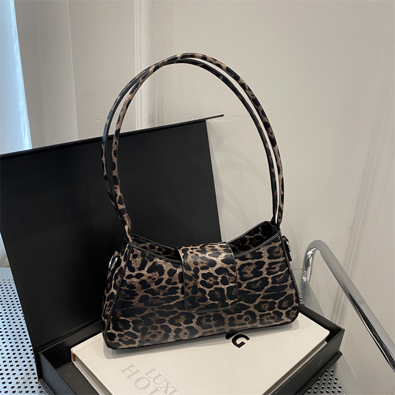 Moda europea y americana bolsos de brazo, leopardo, bolsos de mujer, 2024 invierno, bolsos de moda personales, bolsos de hombro literarios de moda.