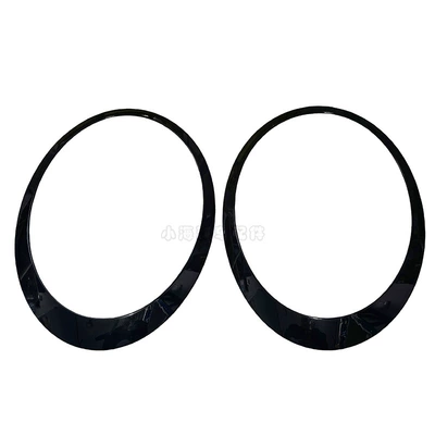 Light frame – Frame - a-pair-of-glossy-black-headlight-frames