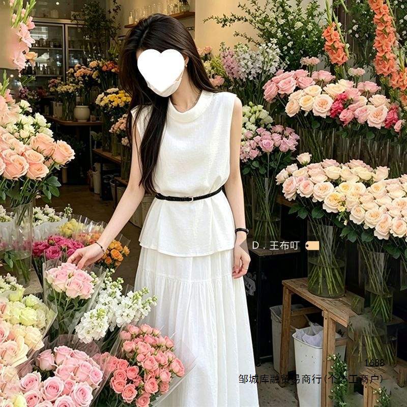 White long skirt 2026 set, high-waisted pleated skirt, sleeveless vest top, elegant summer fashion two-piece set White long skirt 2026 set, high-waisted pleated skirt, sleeveless vest top, elegant summer fashion two-piece set
