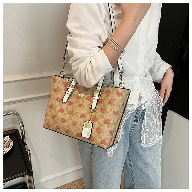 Bolsos de moda europeos y americanos transfronterizos, populares femeninos, bolsos de mensajero de un solo hombro con impresión retro de gran capacidad