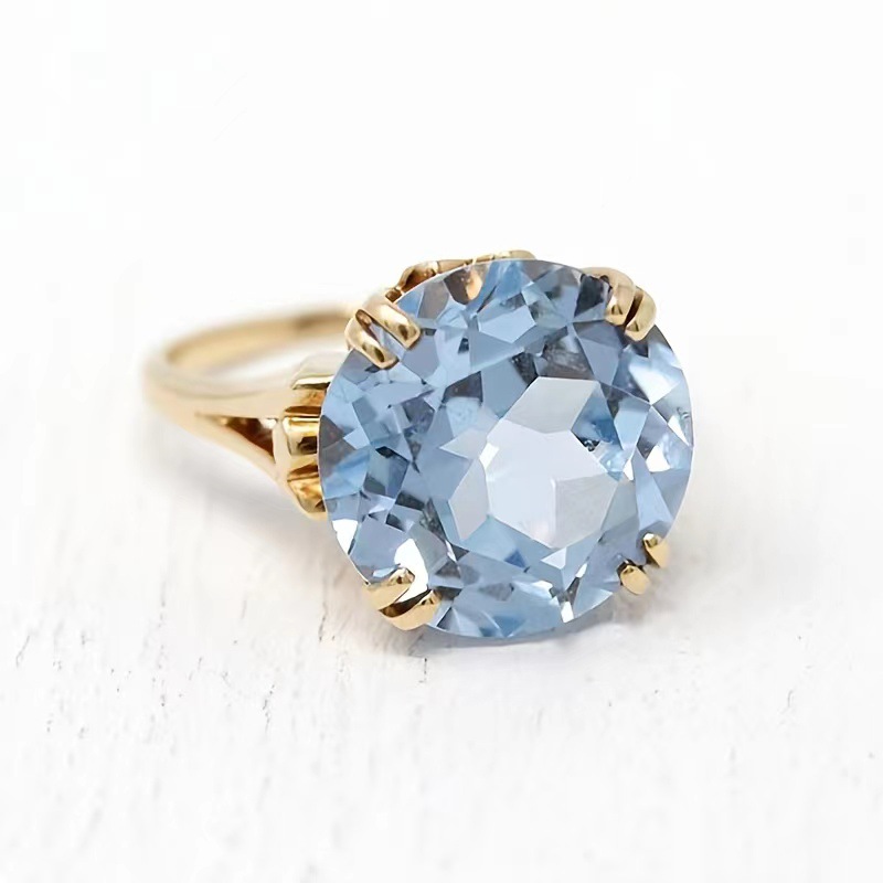 Huajie European and American fashion hot sale engagement proposal goose egg diamond ring inlaid sea blue topaz ring hand