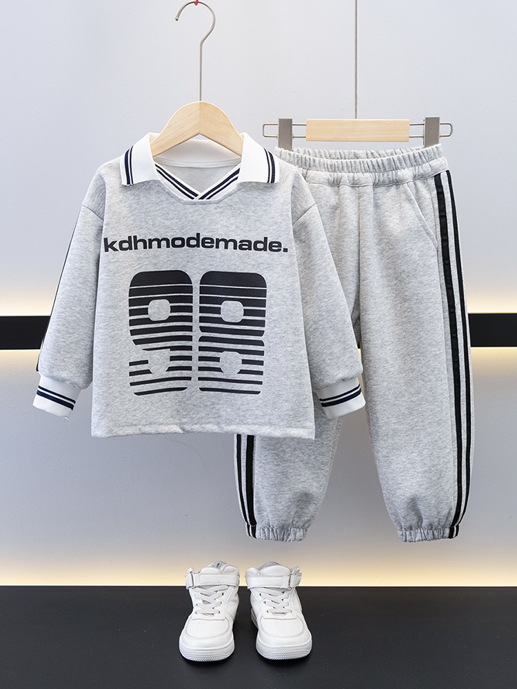 7688 Traje de suéter fresco de moda para niños Primavera y otoño Manga larga suelta deportiva Traje de dos piezas 2025 Nueva ropa casual para niños