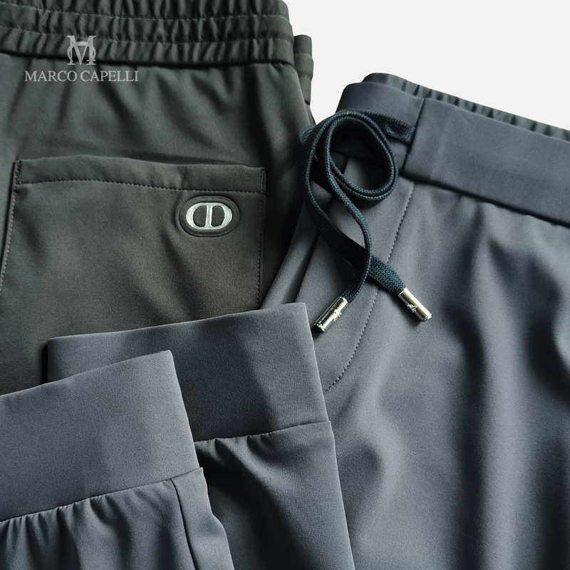 Summer Thin Badge Four-Way Stretch Breathable Drape Ice Silk Men's Jogger Pants Sports Cropped Pants Sk6515 Casual