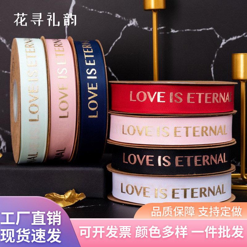 2,5 cm dorado cinta tienda de flores material de DIY floral al por mayor de la flor de poliéster Inglés carta envuelta cinta de la flor