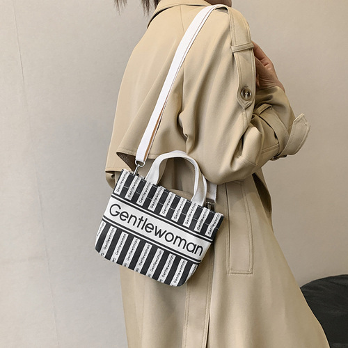 Cross-border wholesale fashion canvas mini shoulder crossbody small bag trendy new striped double-sided letter print handbag
