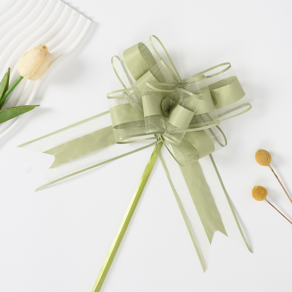 Transfronterizo grande 70 suya nieve arco mano embalaje de regalos de flores decoración de actividades de Navidad dibujar cinta de flores