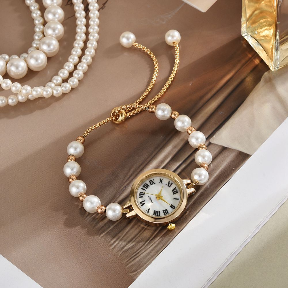Reloj de cuarzo de ajuste libre perezoso, reloj de mujer, temperamento de nicho, lujo ligero, pequeña perla, reloj de pulsera romana, reloj de mujer