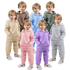 子供服の秋の服の中の大きい子供と子供の純色の帽子の長袖の上着のズボンの子供の服のスーツのファッションブランドの服