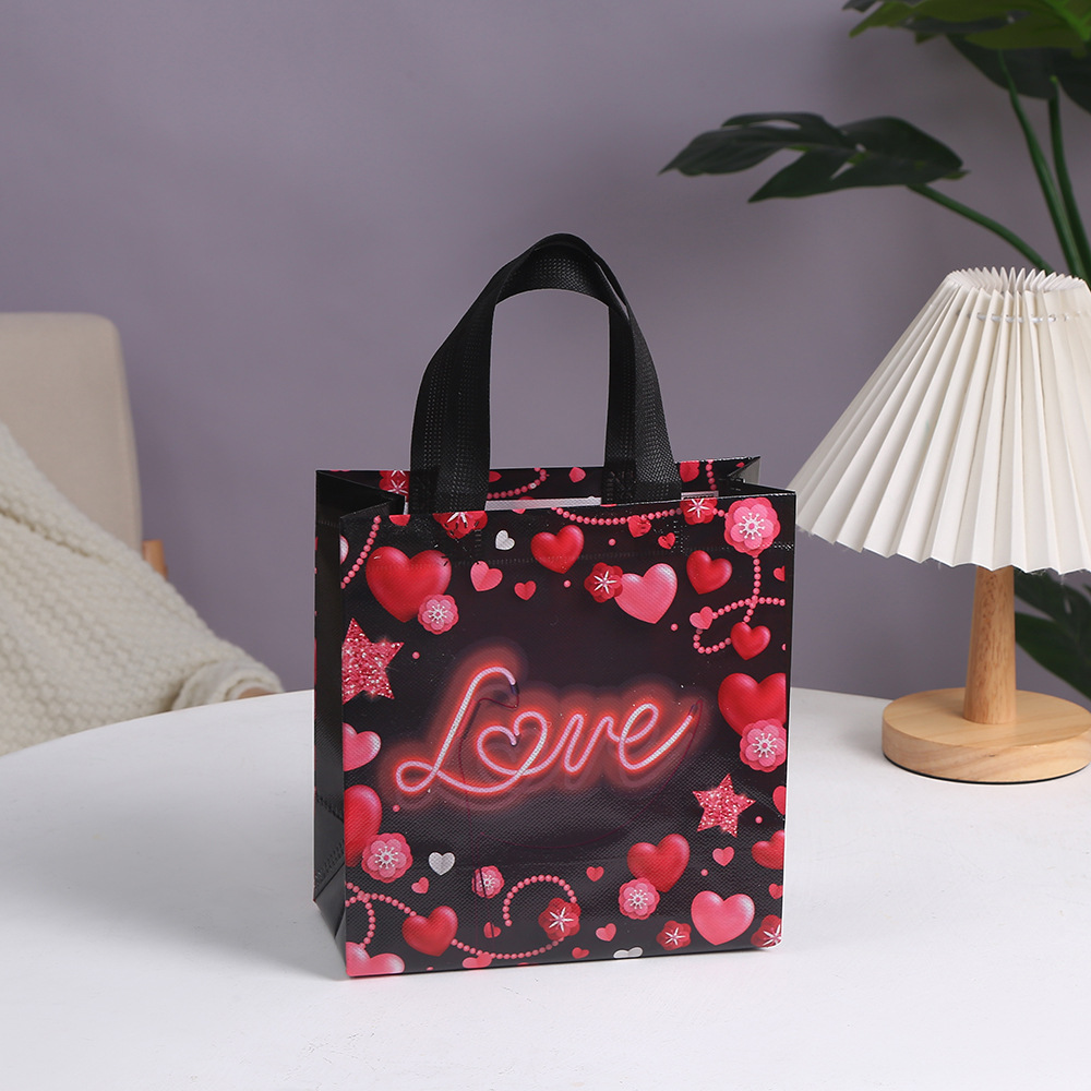 Bolsa de tela no tejida rosa con estampado de corazones para el Día de San Valentín transfronterizo, bolsa de regalo para el Día de San Valentín, bolsa de regalo para joyería.