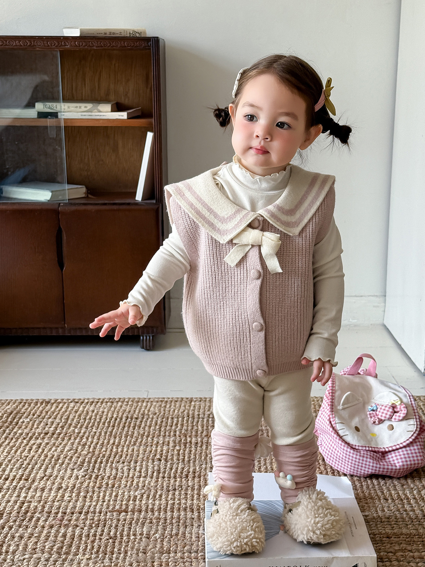 Sugar Pear ropa infantil chaleco de otoño 2025 nuevo suéter de punto para niñas ropa infantil chaleco de bebé de un año