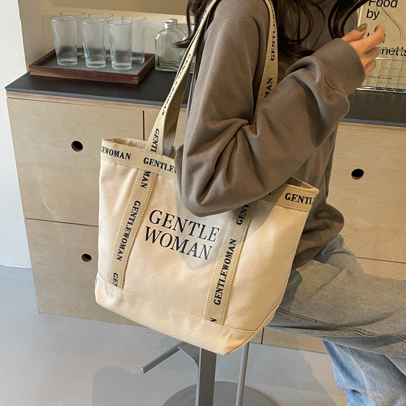 Moda simple lienzo impreso carta bolsa de hombro 2024 gran capacidad de trabajo de alta calidad bolso de mano