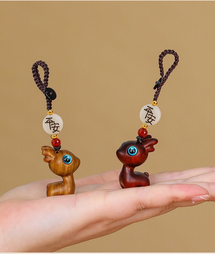 A deer car key chain pendant sandalwood deer buckle key car decoration deer couple pendant