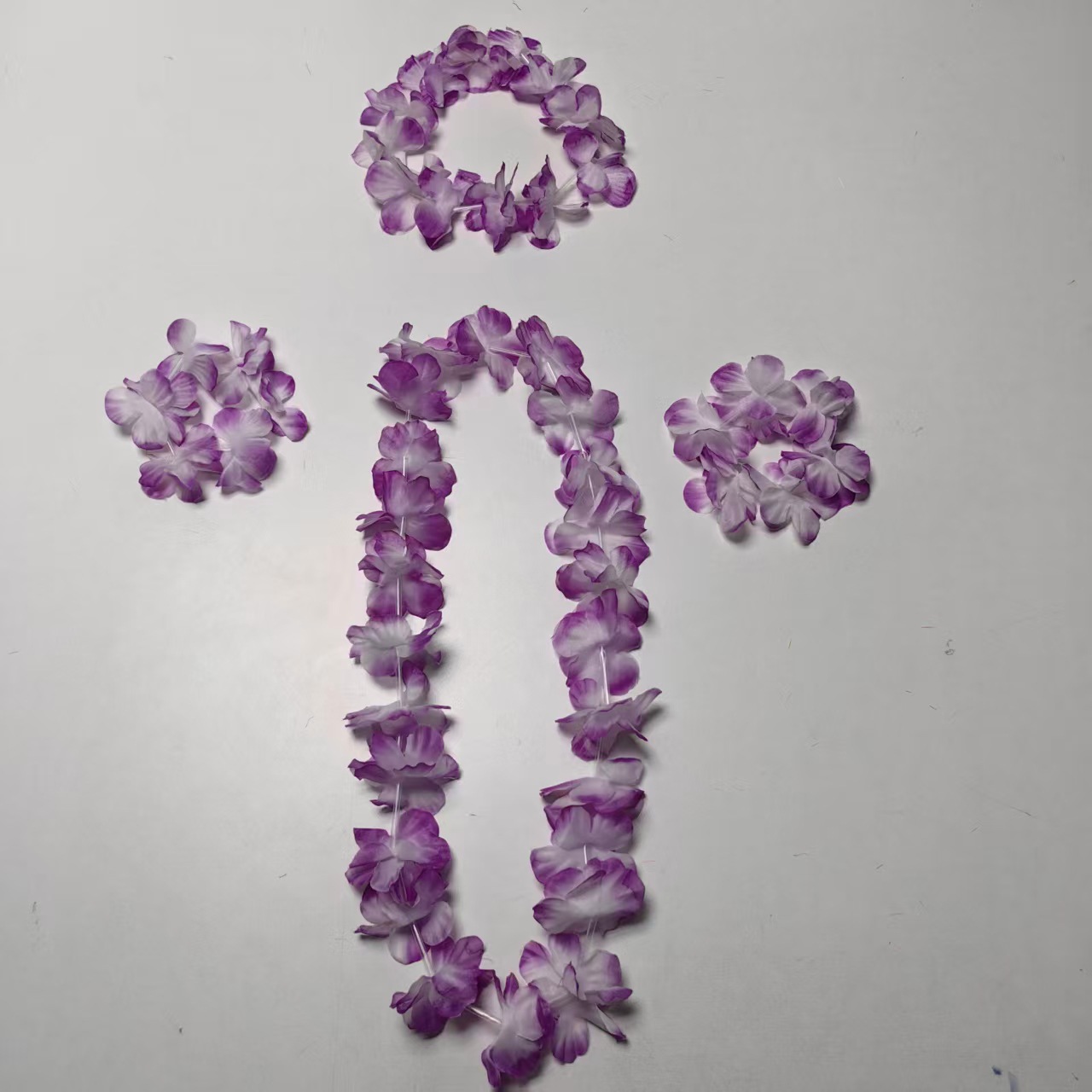 Nuevos productos transfronterizos 56 guirnaldas de flores set fiesta del día de los niños guirnaldas de color playa de arena hawaiana accesorios de falda