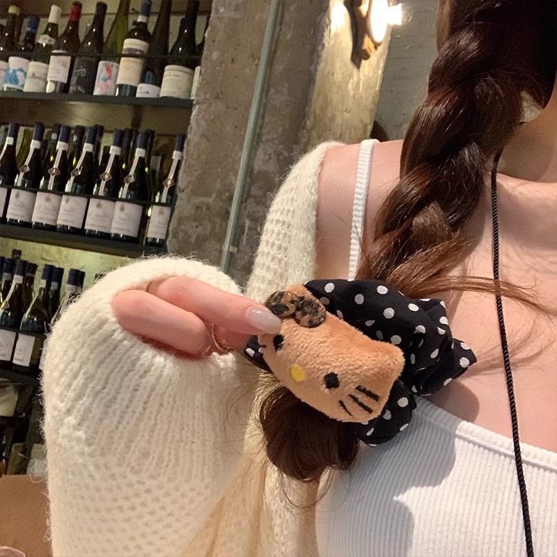 Cute feline Kitty negro y blanco punto de onda de gran intestino anillo de pelo de cola de caballo sensación de alto nivel cabeza de correa de correa de joyas para el pelo