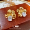 Earrings with zircon, flowered