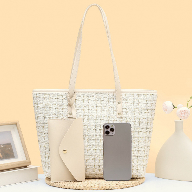 2025 nuevo bolso de cubo de tela de tela de mano de mujer alta calidad bolso de hombro de moda temperamento universal nicho bolso de mochila