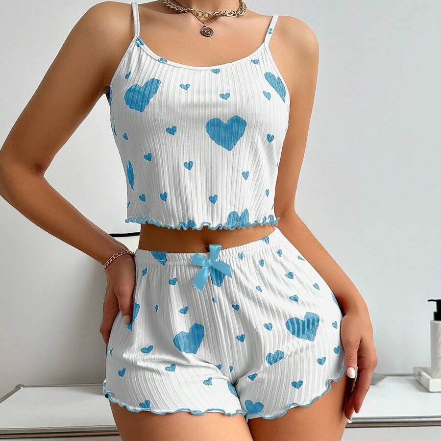 Ropa a domicilio para damas transfronterizas europeas y americanas de dos piezas con hilo estampado de hoyos amor tirantes bowknot pantalones cortos pijamas mujeres