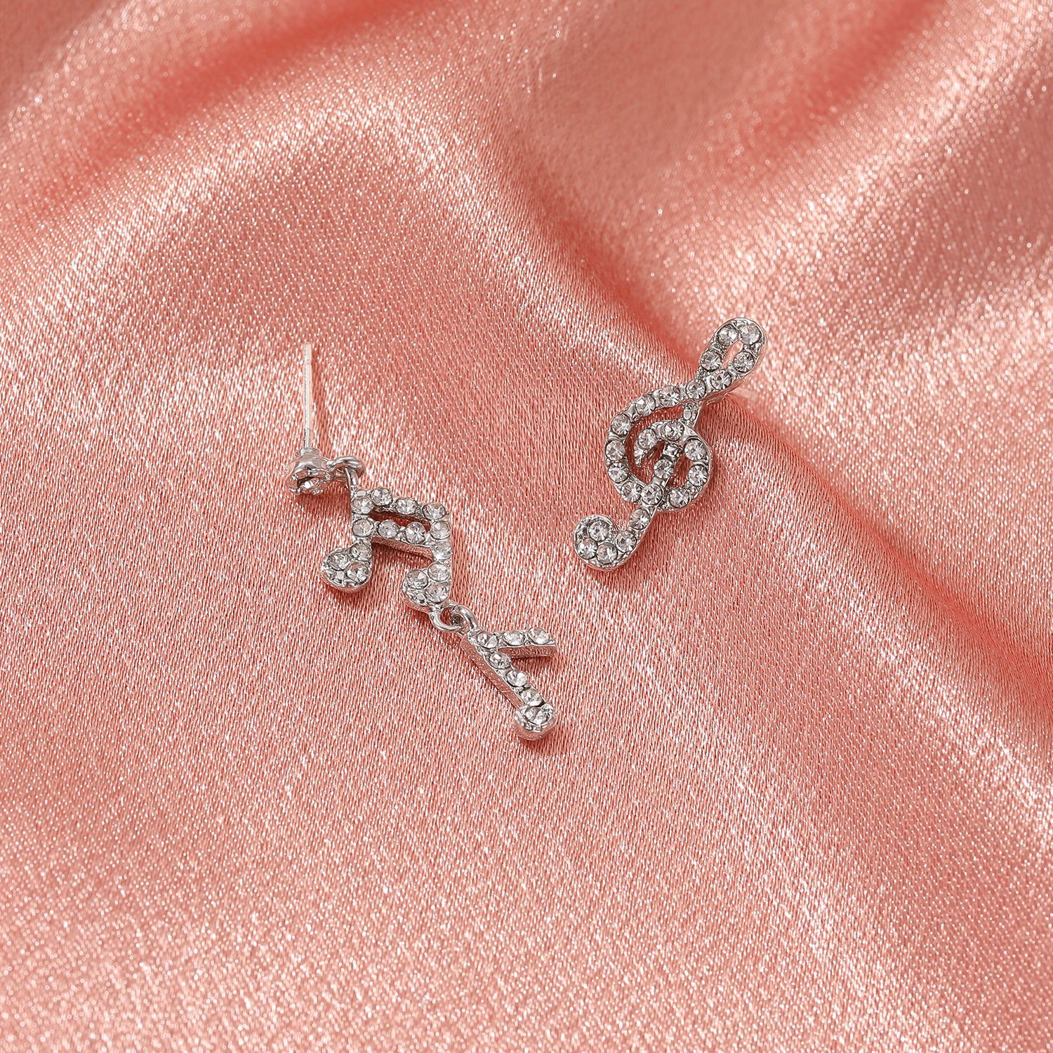 Asymmetrical elegant universal earrings with zircon