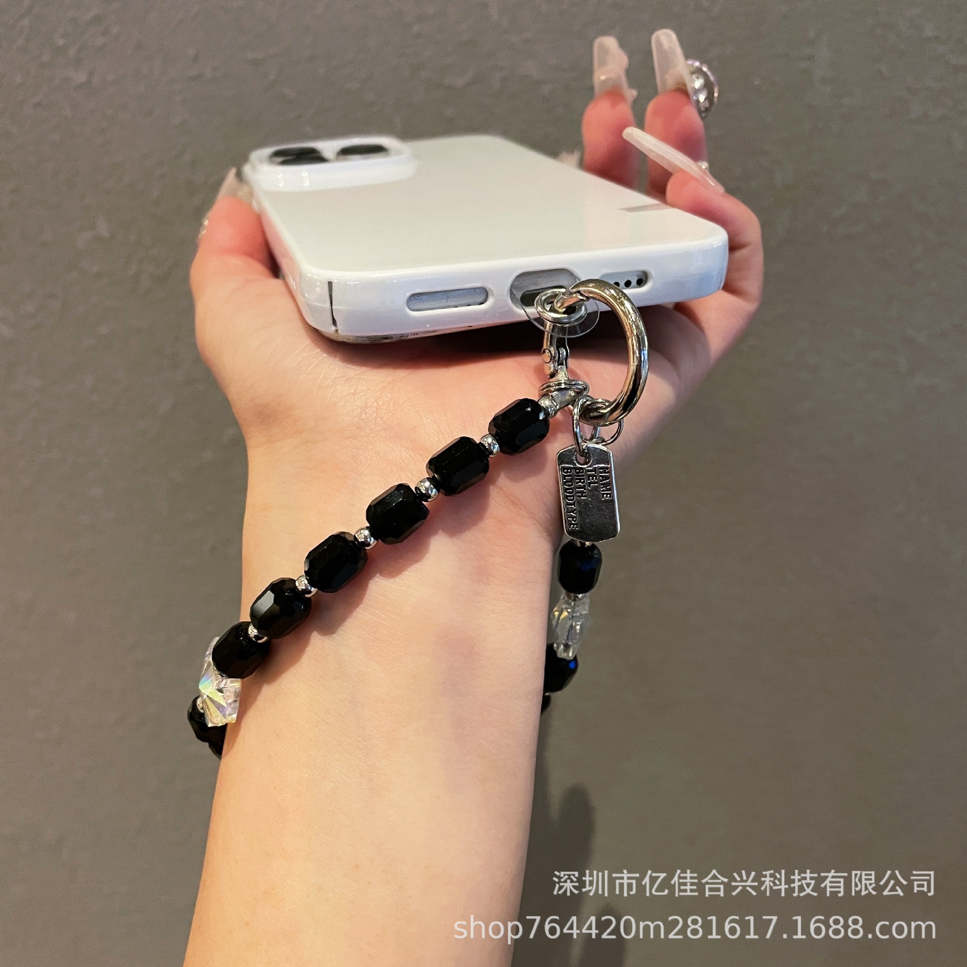 Japón y Corea del Sur estilo transfronterizo nuevo caso de teléfono móvil colgante cadena de cristal string arco de diamante cadena de teléfono móvil colgante de muñeca