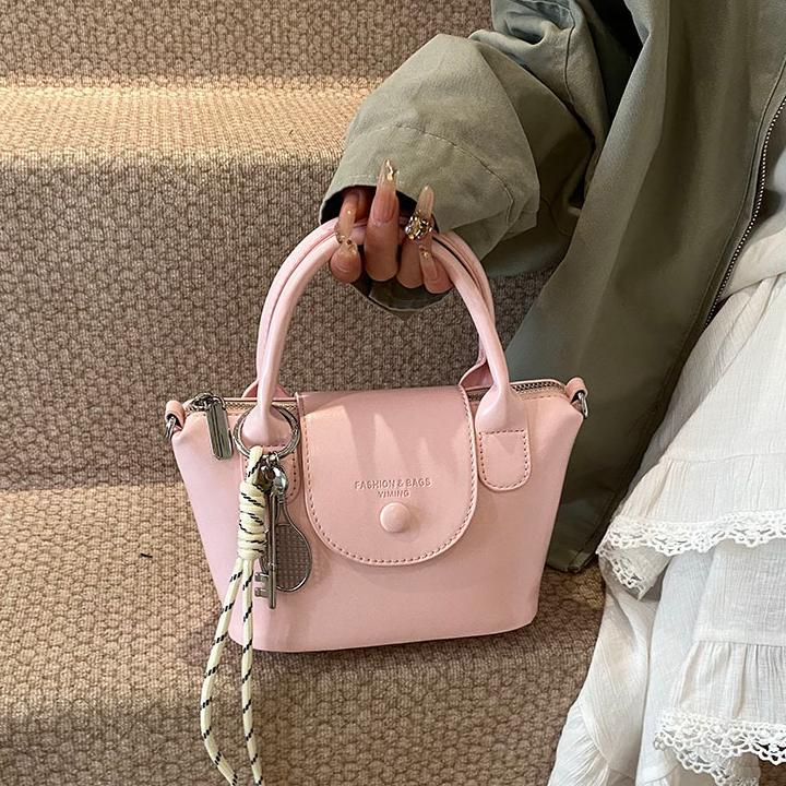 Bolso de mano retro coreano para mujeres 2025 nuevo estilo simple bolso de hombro de moda nicho de alta calidad bolso de mochila