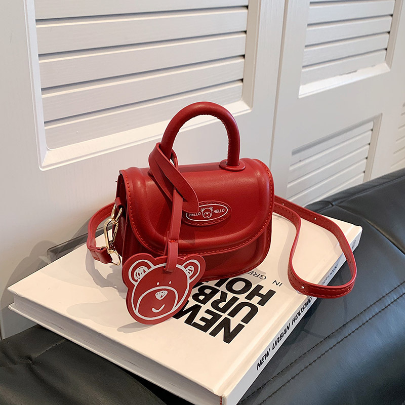 2023 otoño nuevo estilo coreano nicho niños mini mano de la muchacha llevar crossbody accesorios lápiz labial pequeña bolsa al por mayor