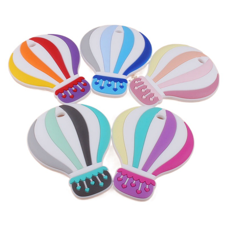 Bebé de dibujos animados colorido globo de aire caliente de silicona teether stick juguete entrenamiento del bebé dientes de molienda palo