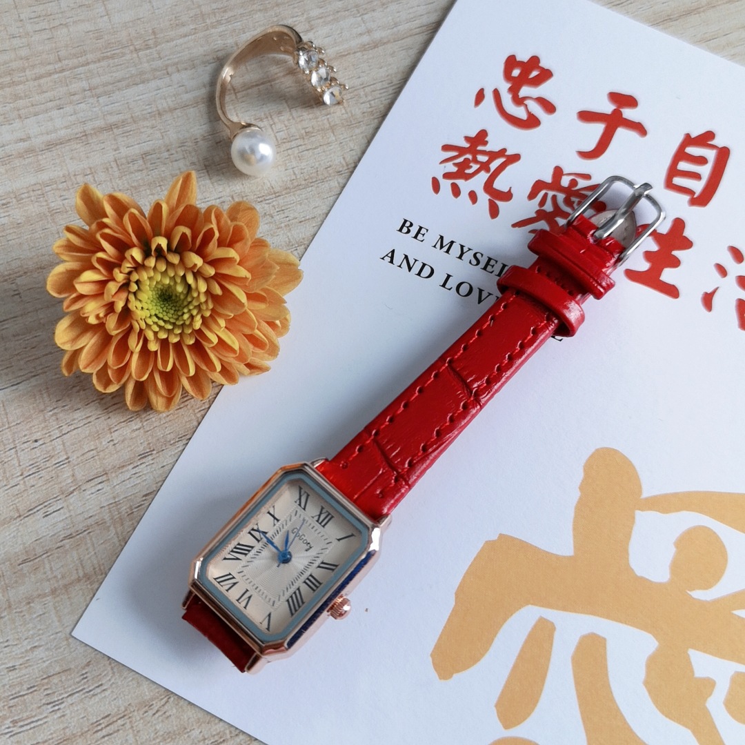 Rose gold shell red band