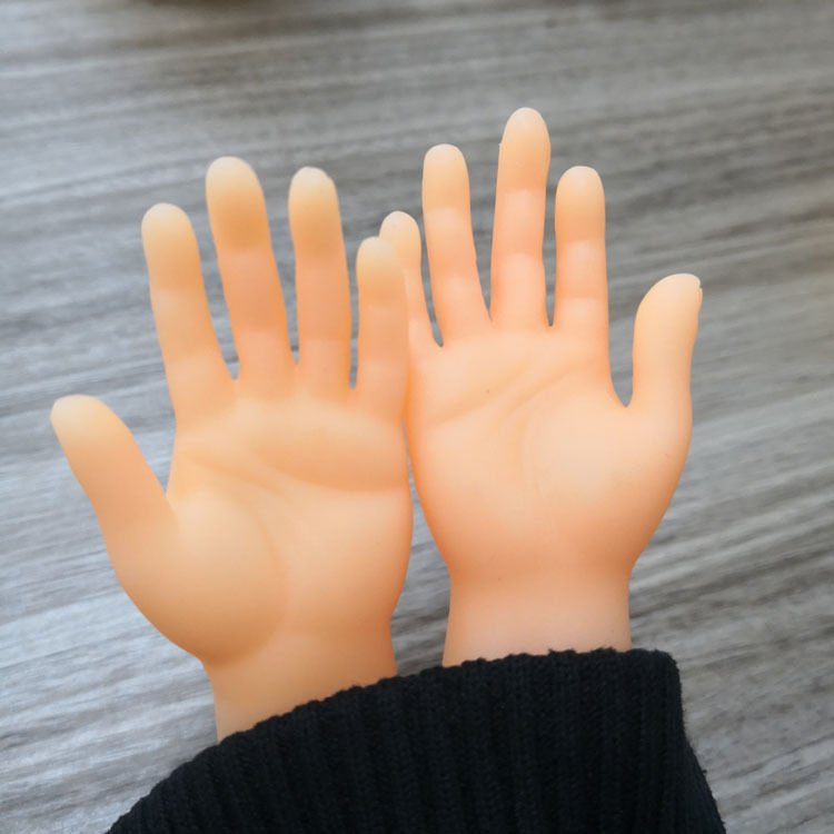 Xiaocao pequeña mano TikTok mismo estilo pequeña Palma tangjiao pequeño dedo juguete para mascotas creativo divertido mano izquierda mano derecha