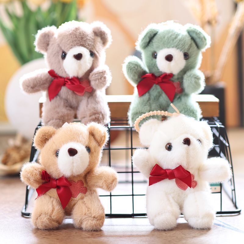 Nuevos juguetes de peluche colgantes muñeca máquina muñeca bolsos lindos colgantes bolsos colgantes llaveros al por mayor