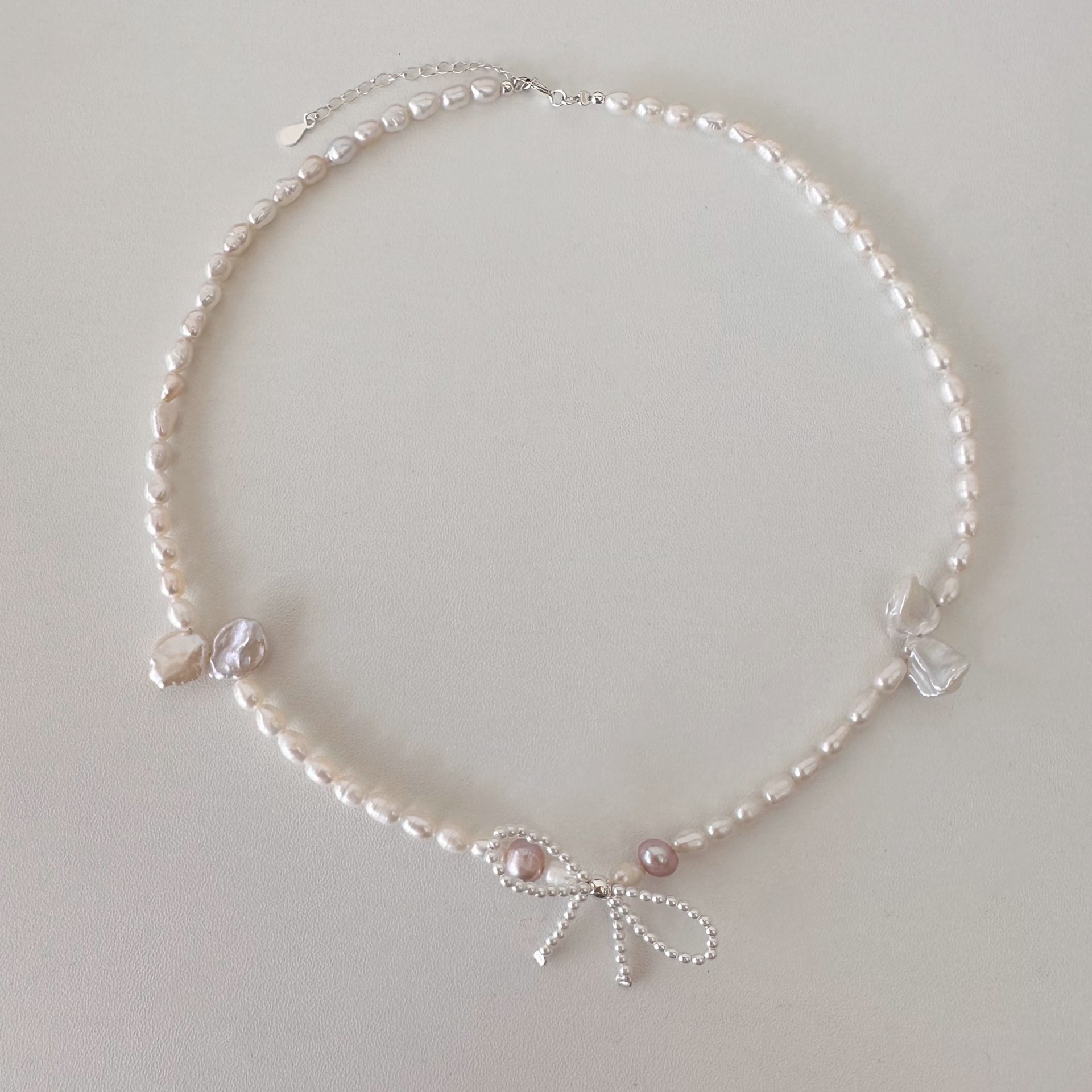 Necklace from pearl with bow