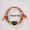 1139-09 Square bead yellow eyes