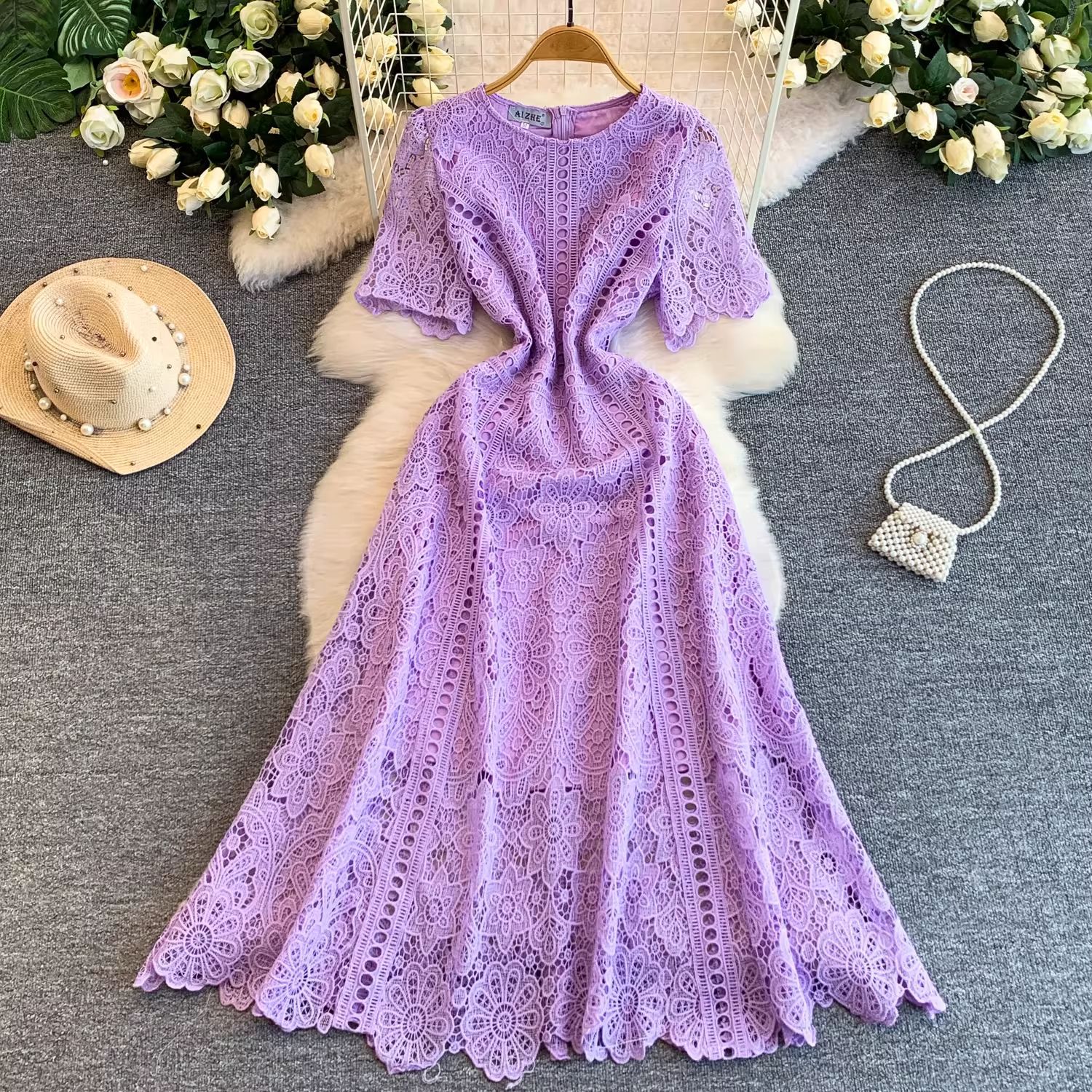 Lace summer dress with a round collar