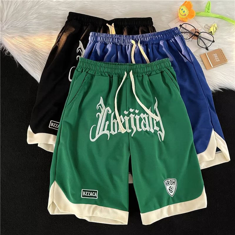 Marca de moda color sólido costura de contraste simple tubo recto suelto de cinco puntos pantalones deportivos casuales de verano pantalones cortos masculinos ins